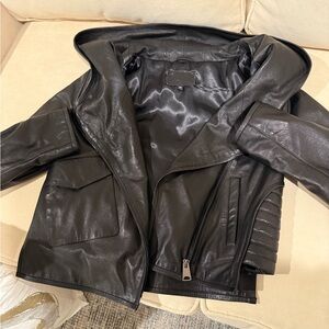 Woman’s  Black Fake Leather Jacket with hood . Size M. runs small.
